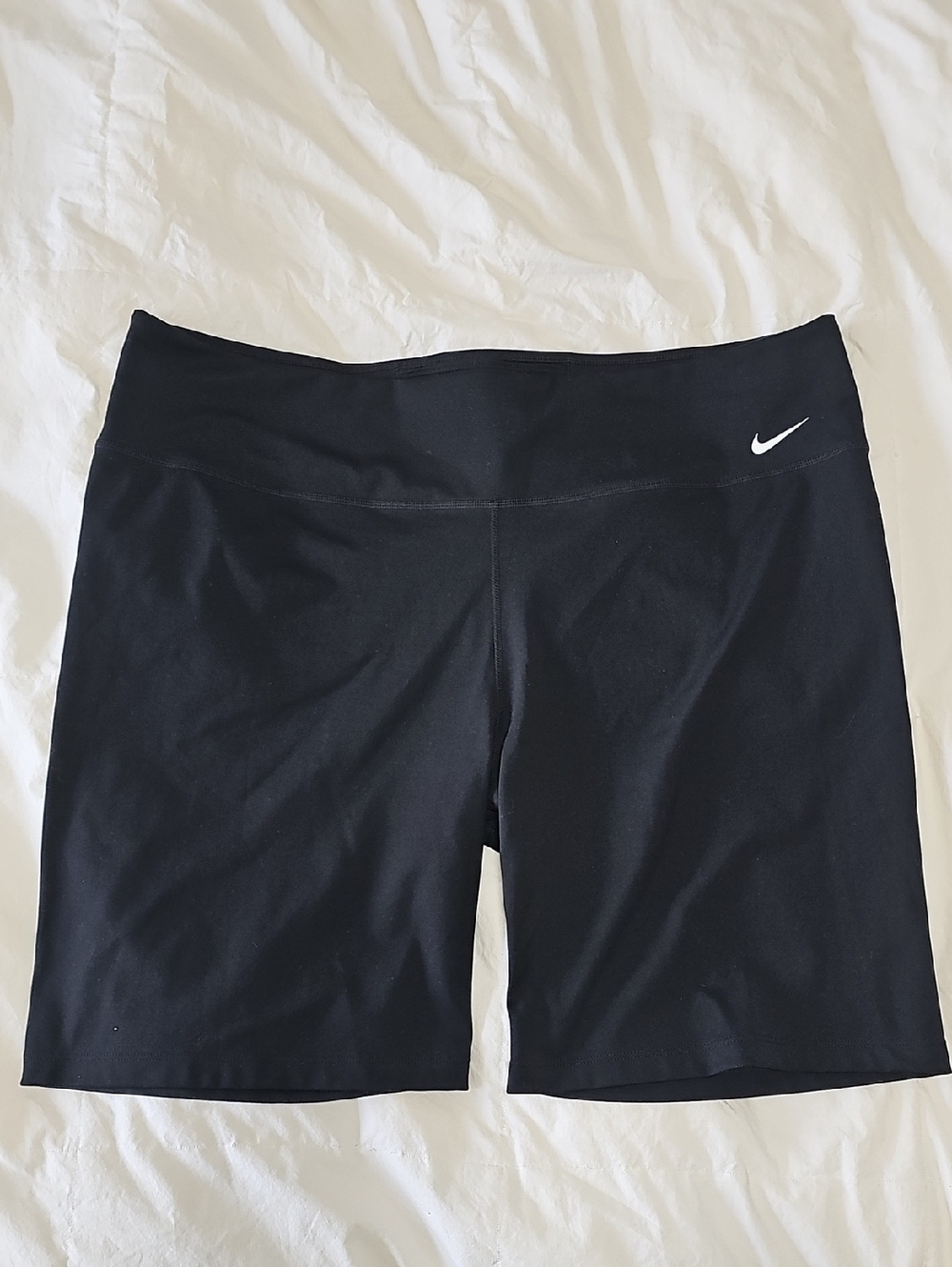 Nike Women's Black Mid-Thigh Bike Shorts with White Swoosh